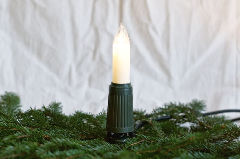 MK ILLUMINATION - Lichterkette 15-tlg. -ÜBERLÄNGE- Lampe E14, 16V, 4W, Schaft: grün