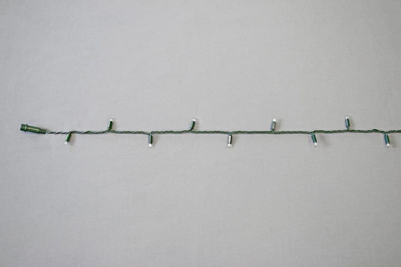 MK ILLUMINATION - LED String Lite 120 LED WW,12m,grün PVC Kabel 10,5W